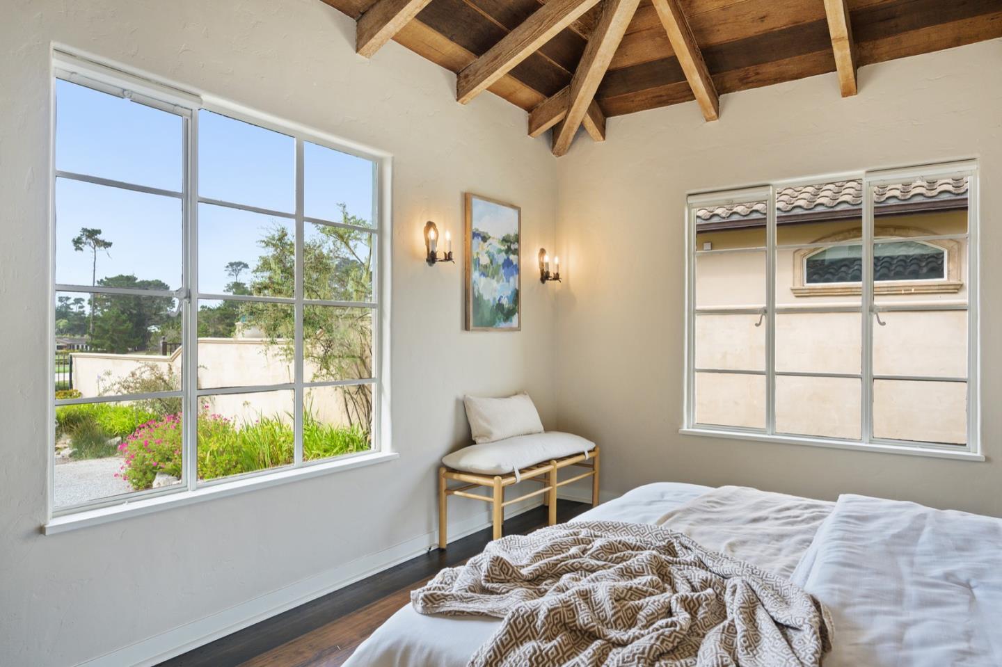 3080 Bird Rock Road Pebble Beach, CA 93953 - Photo 27 of 46 a bedroom with a bed and a window