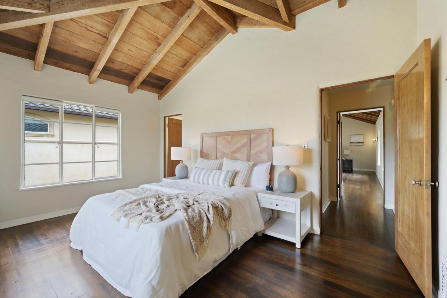 3080 Bird Rock Road Pebble Beach, CA 93953 - Photo 29 of 46 a bedroom with a bed and a window