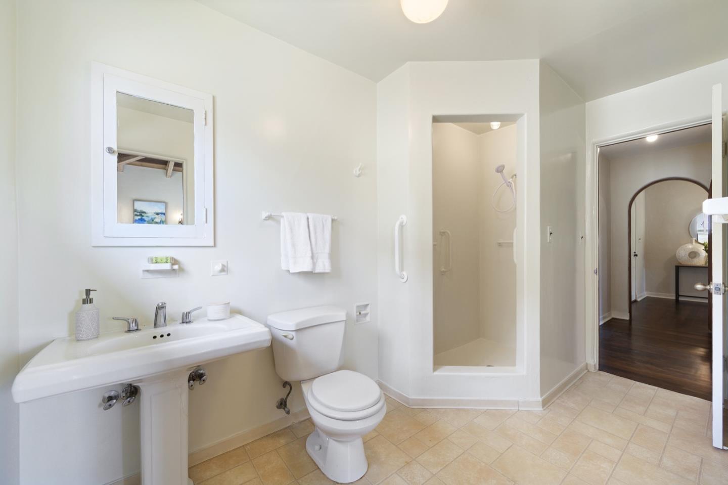 3080 Bird Rock Road Pebble Beach, CA 93953 - Photo 30 of 46 a bathroom with a sink toilet and shower