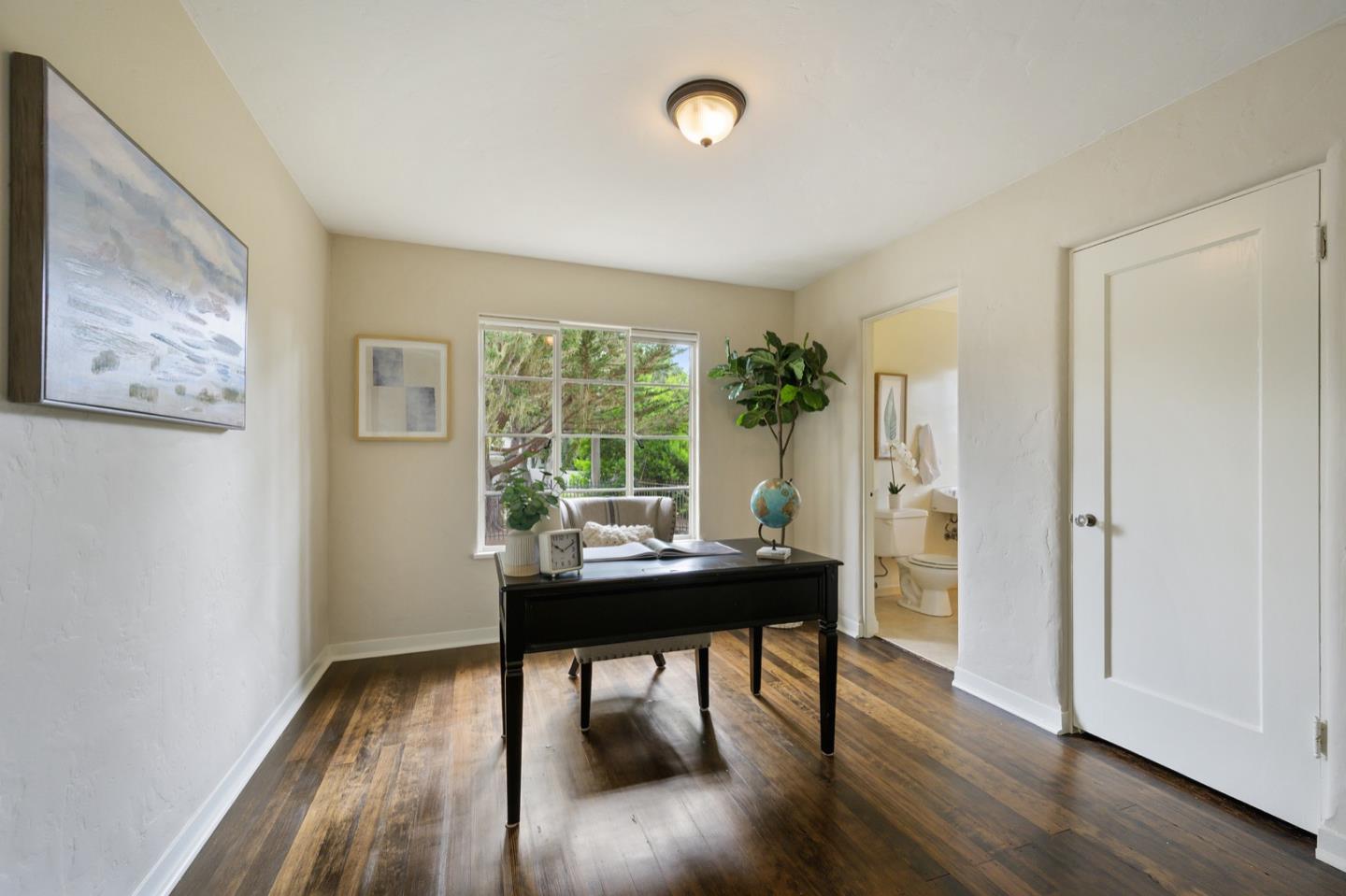 3080 Bird Rock Road Pebble Beach, CA 93953 - Photo 31 of 46 a view of a dining room with furniture and wooden floor