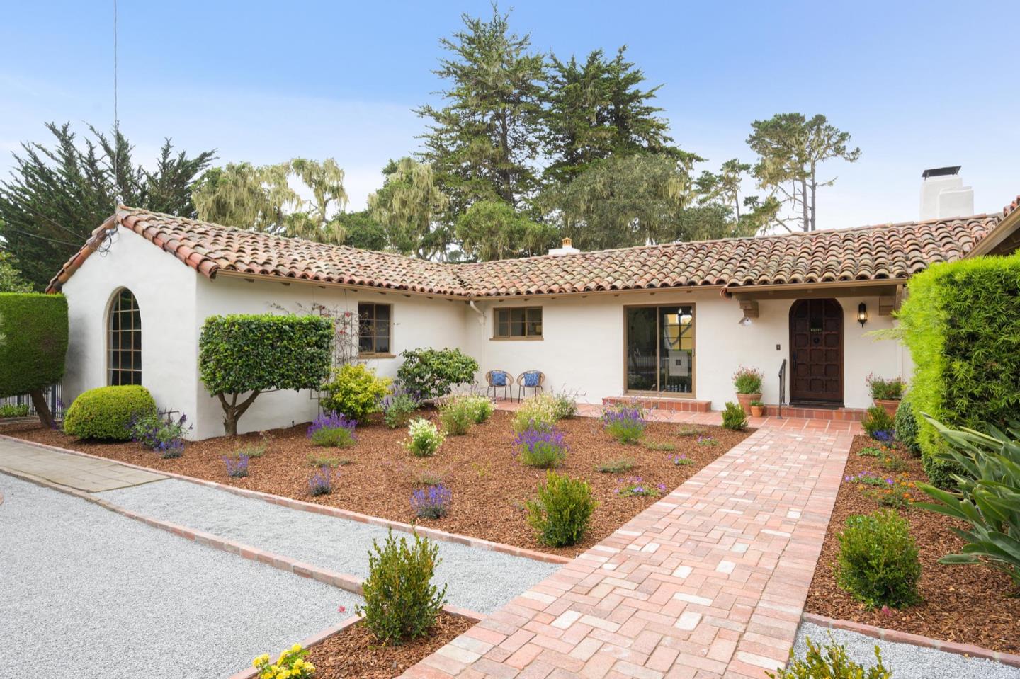 3080 Bird Rock Road Pebble Beach, CA 93953 - Photo 33 of 46 a front view of a house with garden