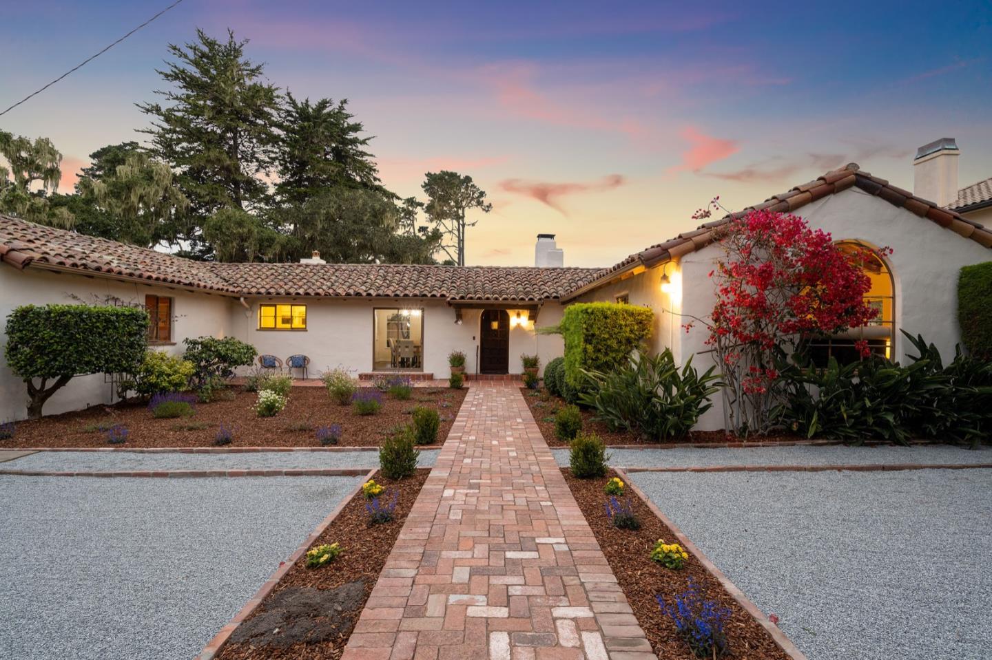 3080 Bird Rock Road Pebble Beach, CA 93953 - Photo 35 of 46 a front view of a house with yard
