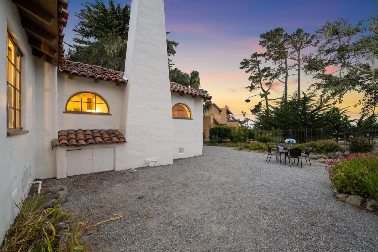 3080 Bird Rock Road Pebble Beach, CA 93953 - Photo 39 of 46 a view of swimming pool with outdoor seating and a potted plant