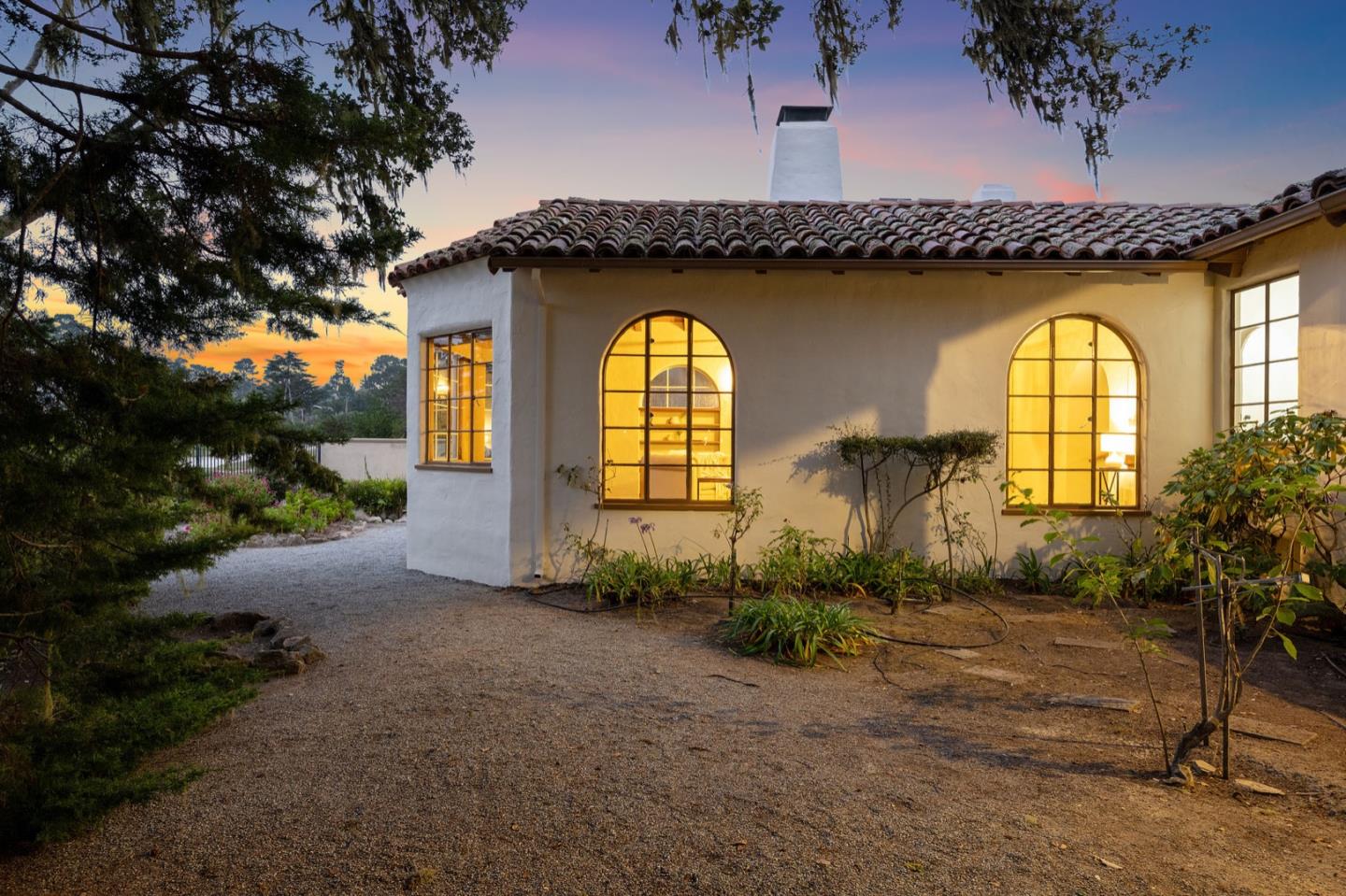3080 Bird Rock Road Pebble Beach, CA 93953 - Photo 40 of 46 a front view of a house with garden