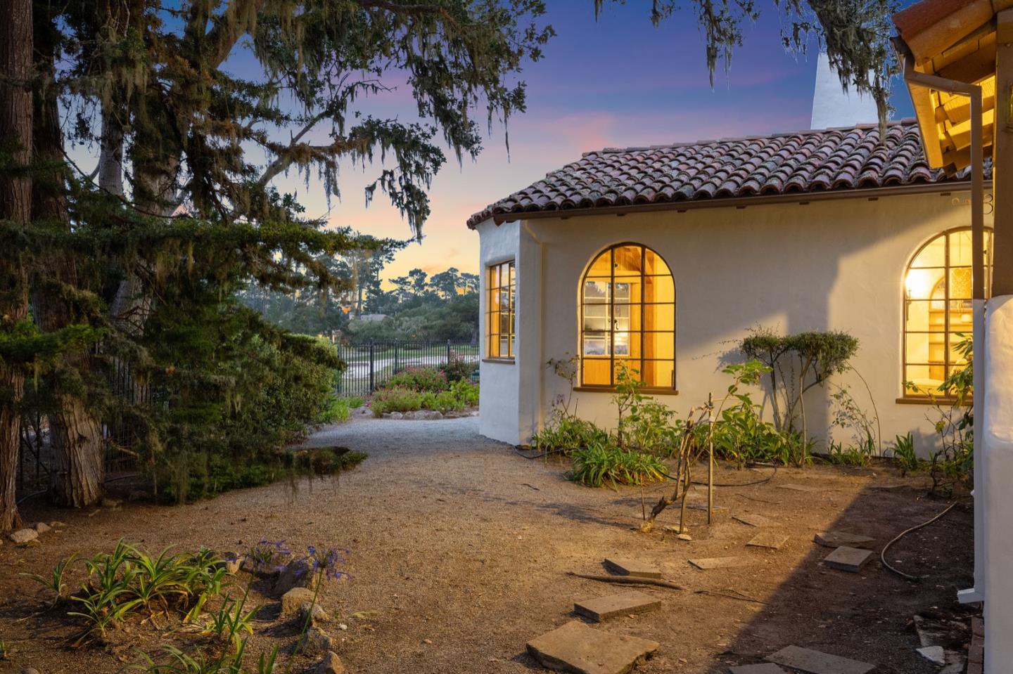 3080 Bird Rock Road Pebble Beach, CA 93953 - Photo 41 of 46 a front view of a house with garden