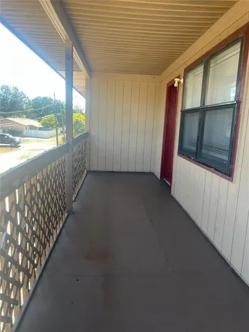 a kitchen with stainless steel appliances granite countertop a stove a sink dishwasher and a microwave oven with cabinets