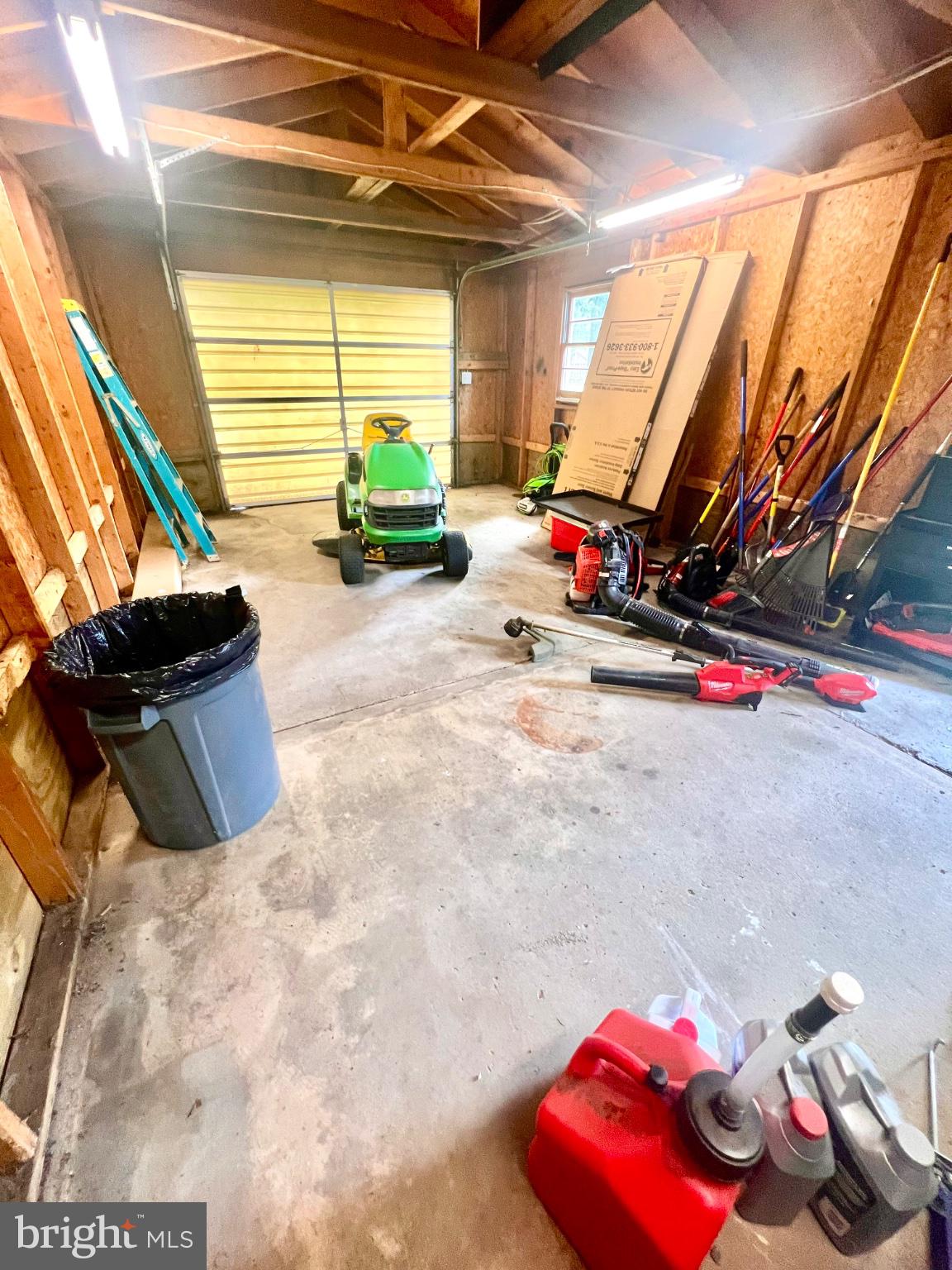 26576 Three Notch Road Mechanicsville, MD 20659 - Photo 20 of 20 Spacious garage with tools and equipment.