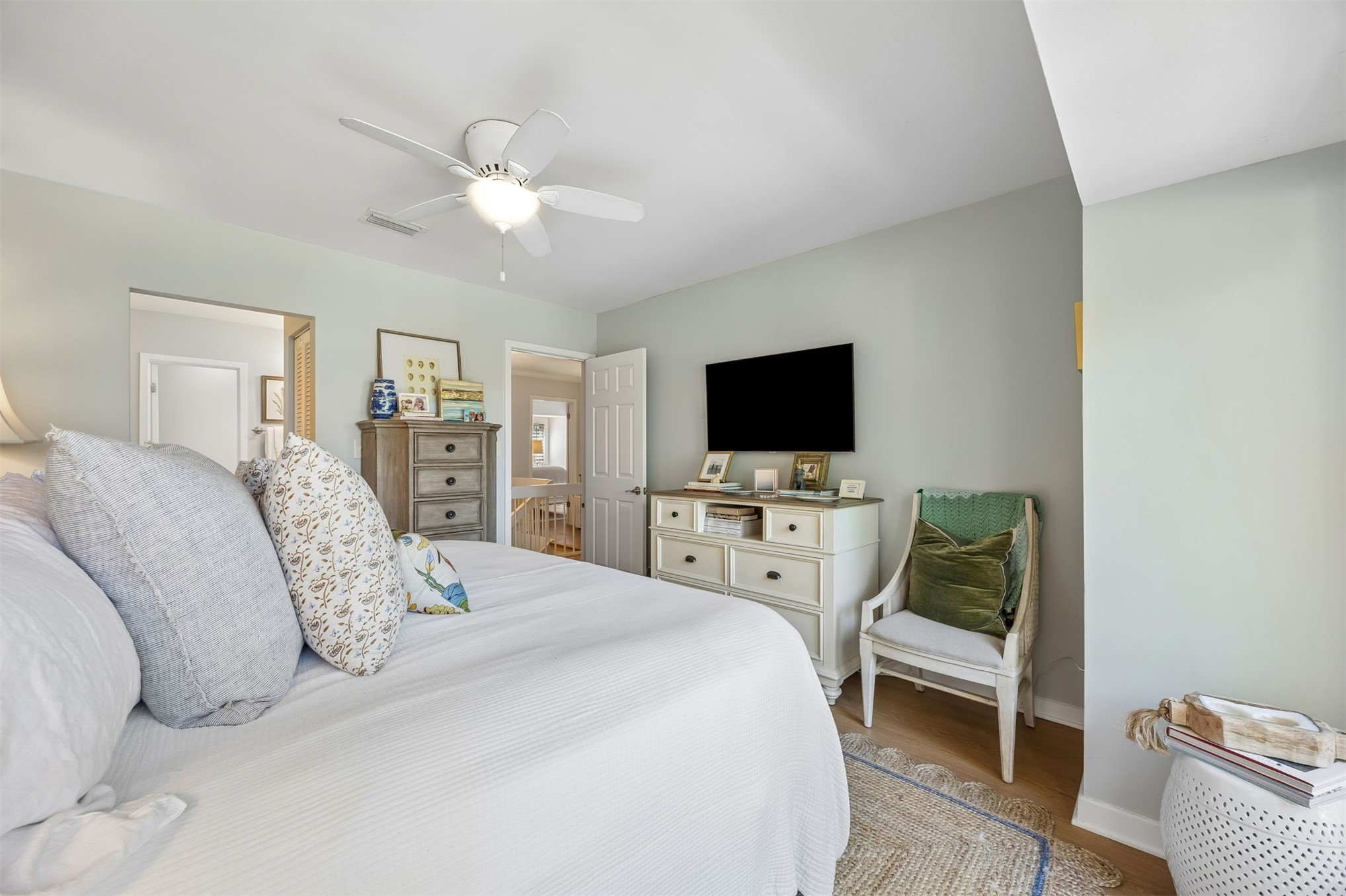 2005 Beachwood Road, Unit 2005 Amelia Island, FL 32034 - Photo 15 of 43 a bedroom with a bed and a flat screen tv