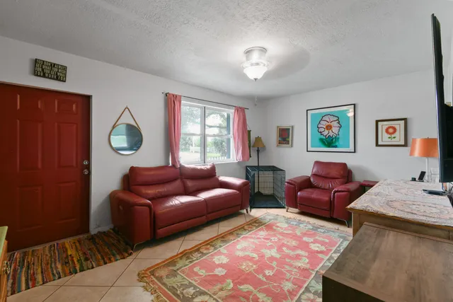 a living room with furniture and a couch