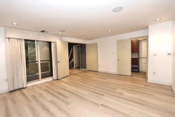 a bathroom with a shower and a toilet