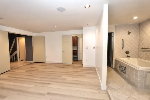 a view of a pathway with a yard