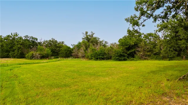 a view of a lake with a city