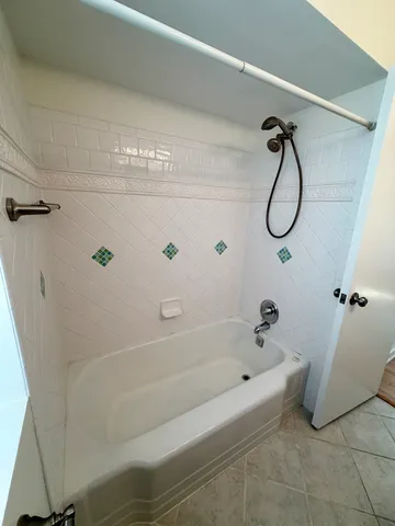 a bathroom with a sink toilet and mirror