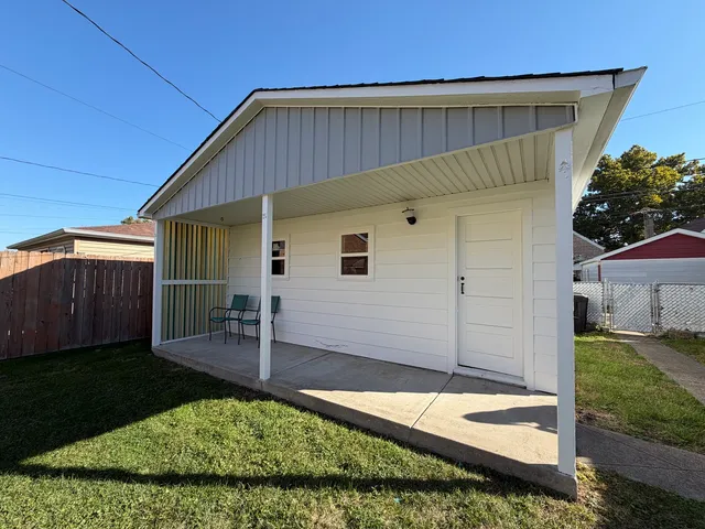 a front view of a house with yard