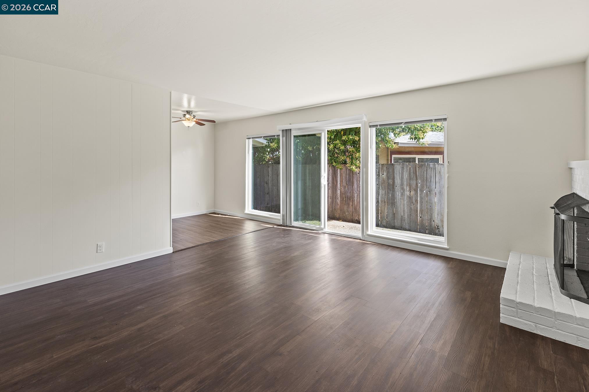 29 Leafwood Circle San Rafael, CA 94901 - Photo 12 of 34 an empty room with wooden floor and a window
