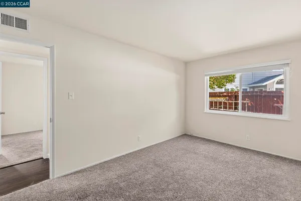 an empty room with windows
