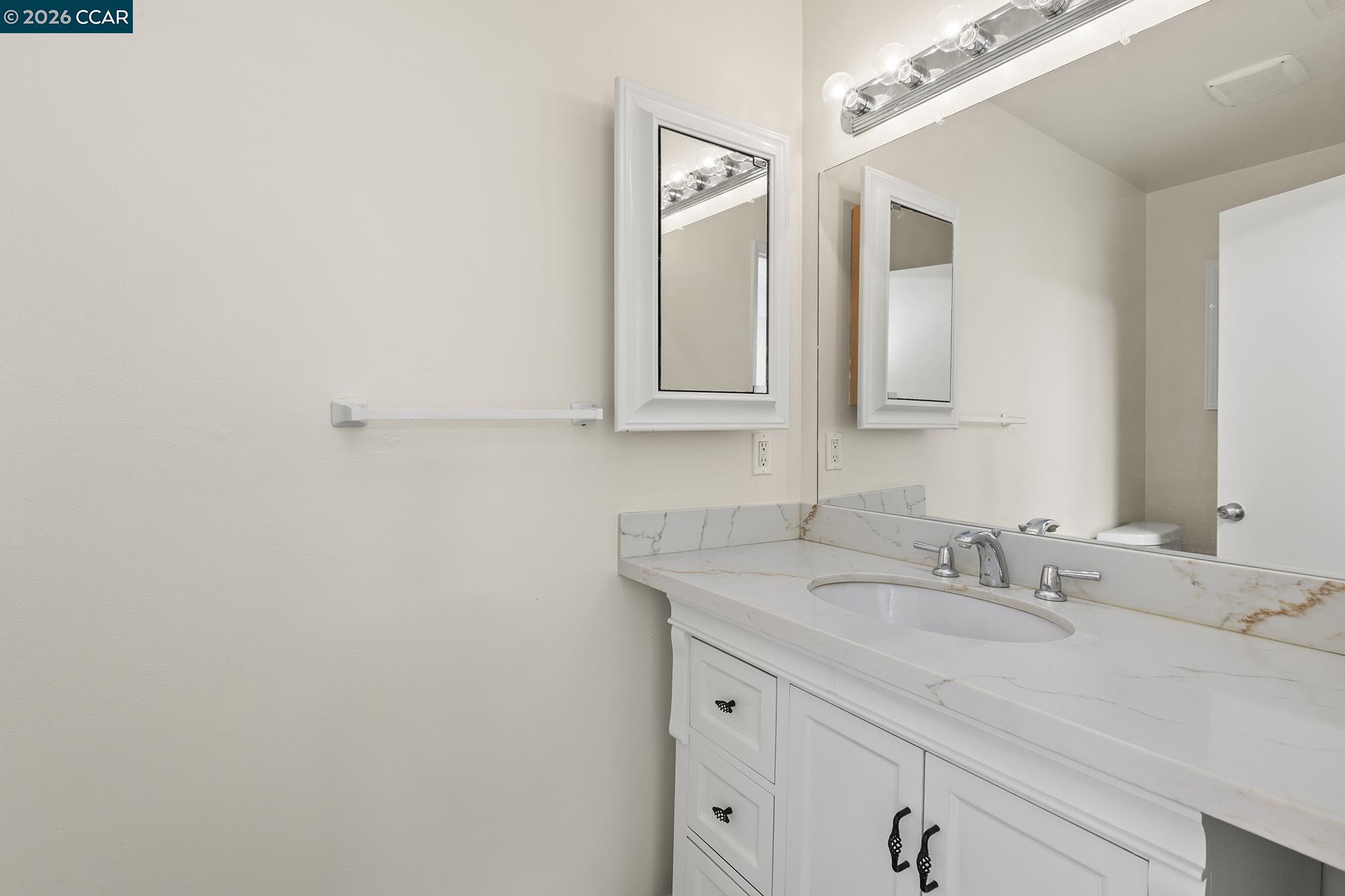 29 Leafwood Circle San Rafael, CA 94901 - Photo 20 of 34 a bathroom with a sink and a mirror
