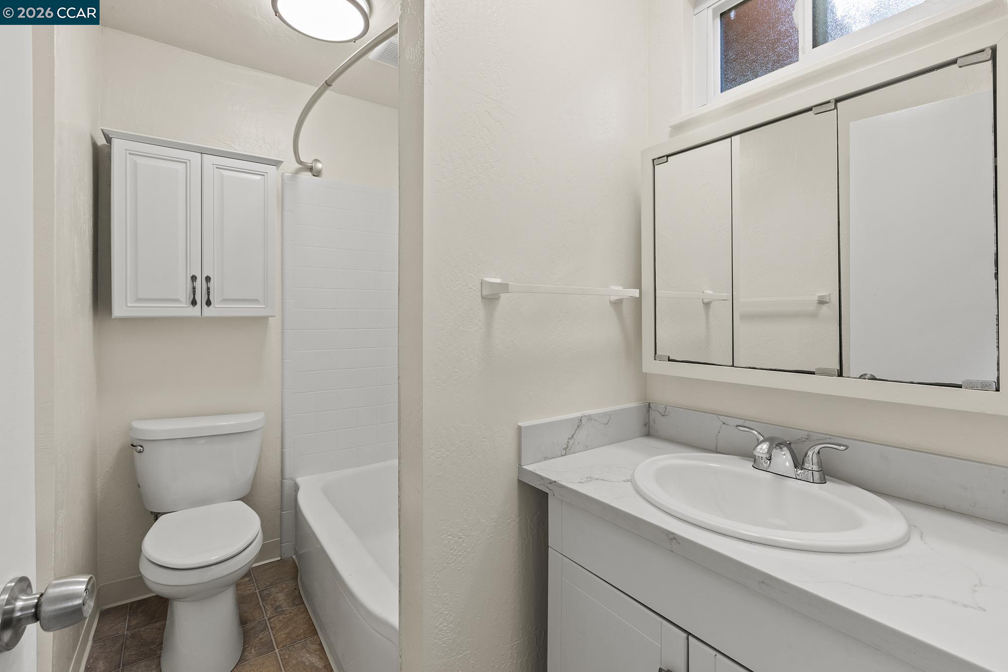 29 Leafwood Circle San Rafael, CA 94901 - Photo 21 of 34 a bathroom with a sink a toilet and shower
