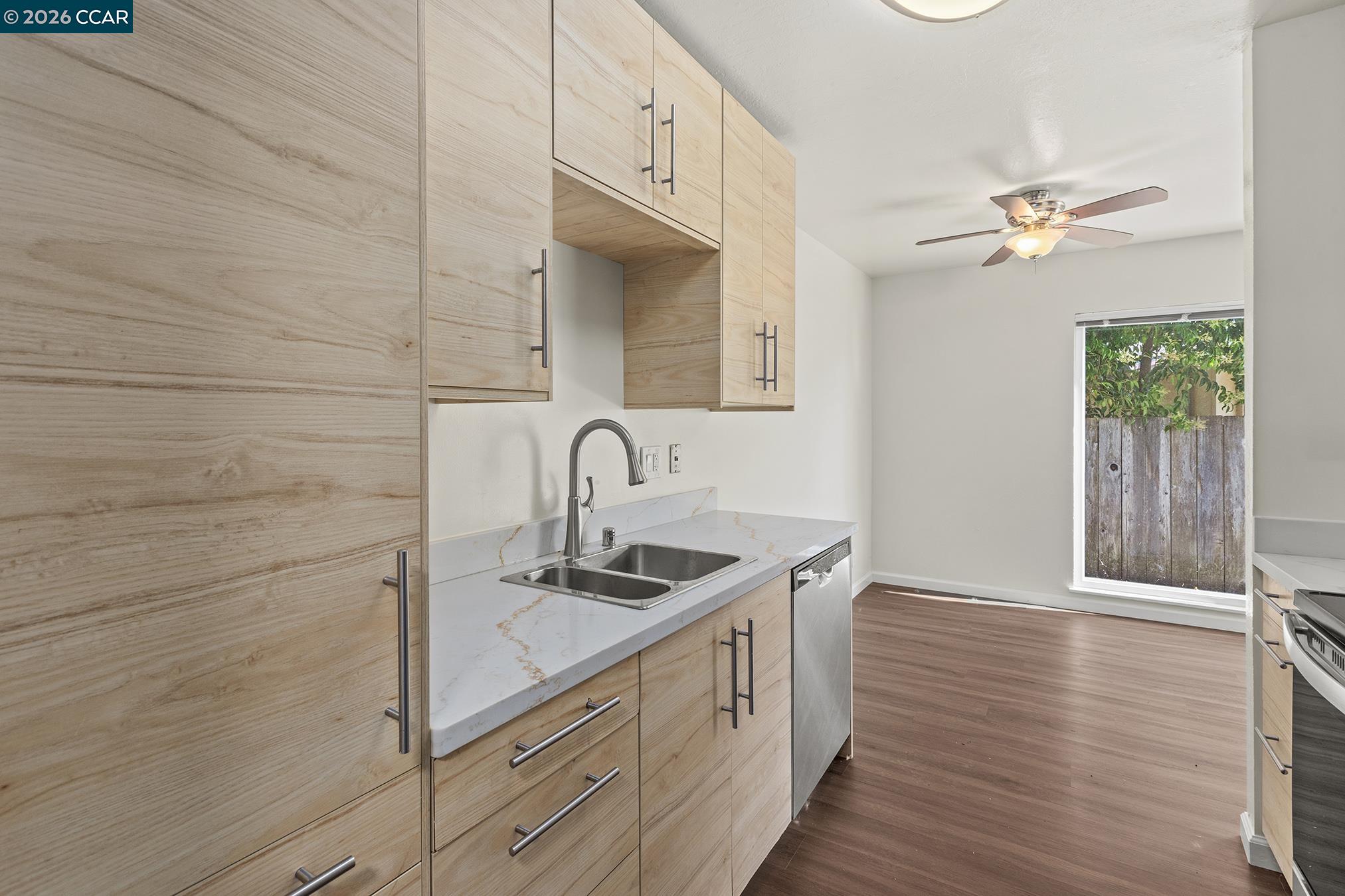 29 Leafwood Circle San Rafael, CA 94901 - Photo 6 of 34 a kitchen that has a sink stainless steel appliances and cabinets
