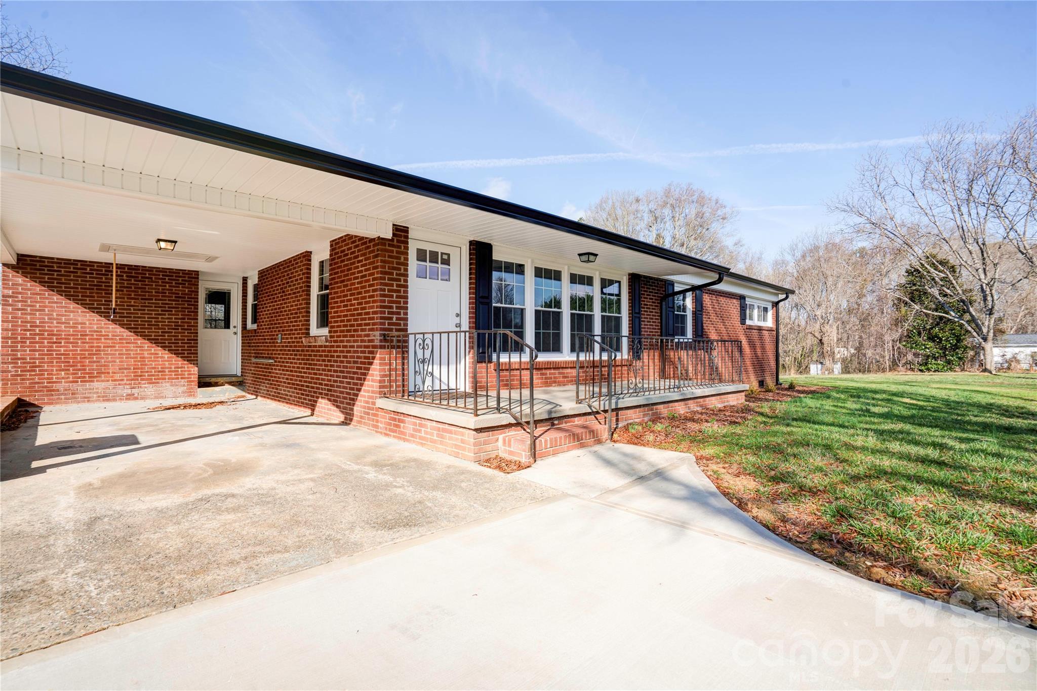 2822 Bettis Road Grover, NC 28073 - Photo 6 of 32 a view of a house with backyard and trees