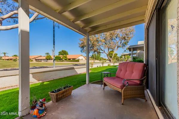a garden view with a seating space