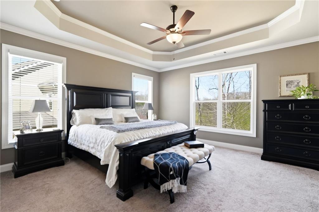 8840 Hightower Ridge Ball Ground, GA 30107 - Photo 23 of 74 a bed room with a bed and a window