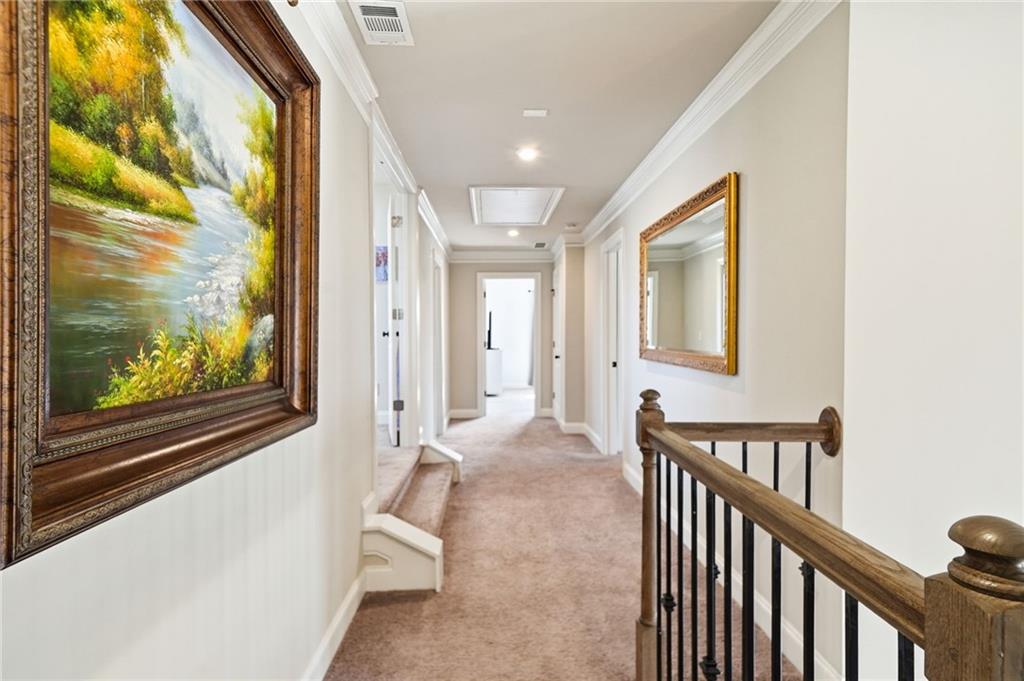 8840 Hightower Ridge Ball Ground, GA 30107 - Photo 29 of 74 a view of a hallway with furniture and windows