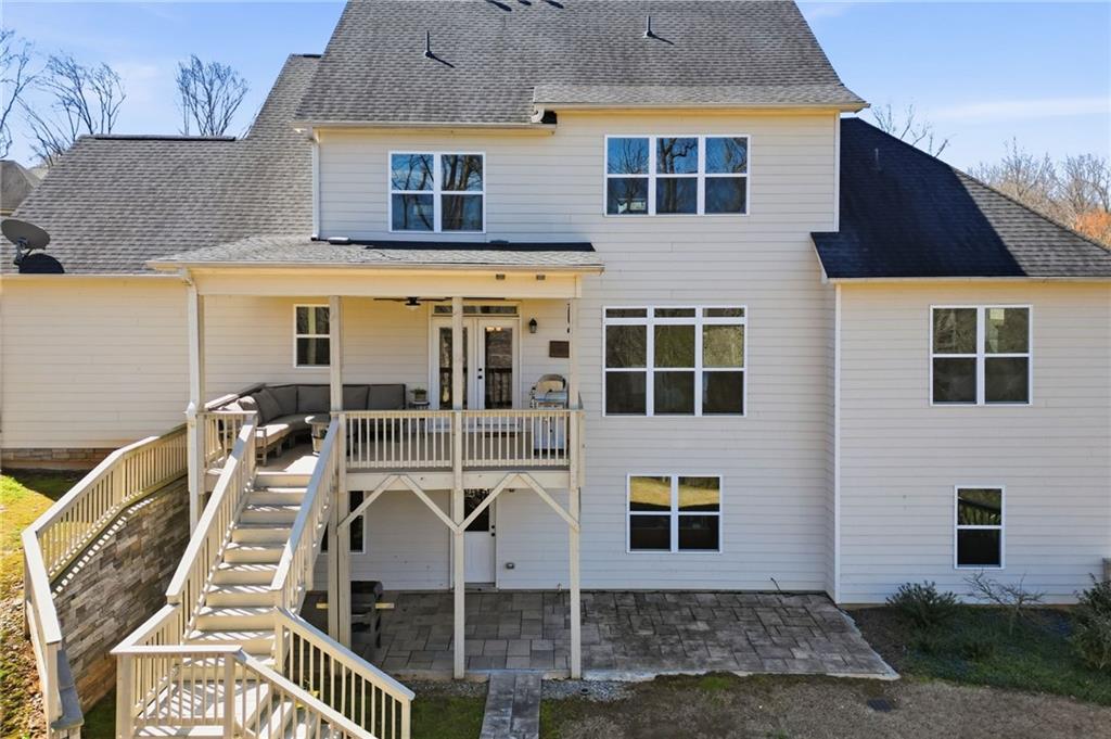 8840 Hightower Ridge Ball Ground, GA 30107 - Photo 49 of 74 a front view of a house with balcony
