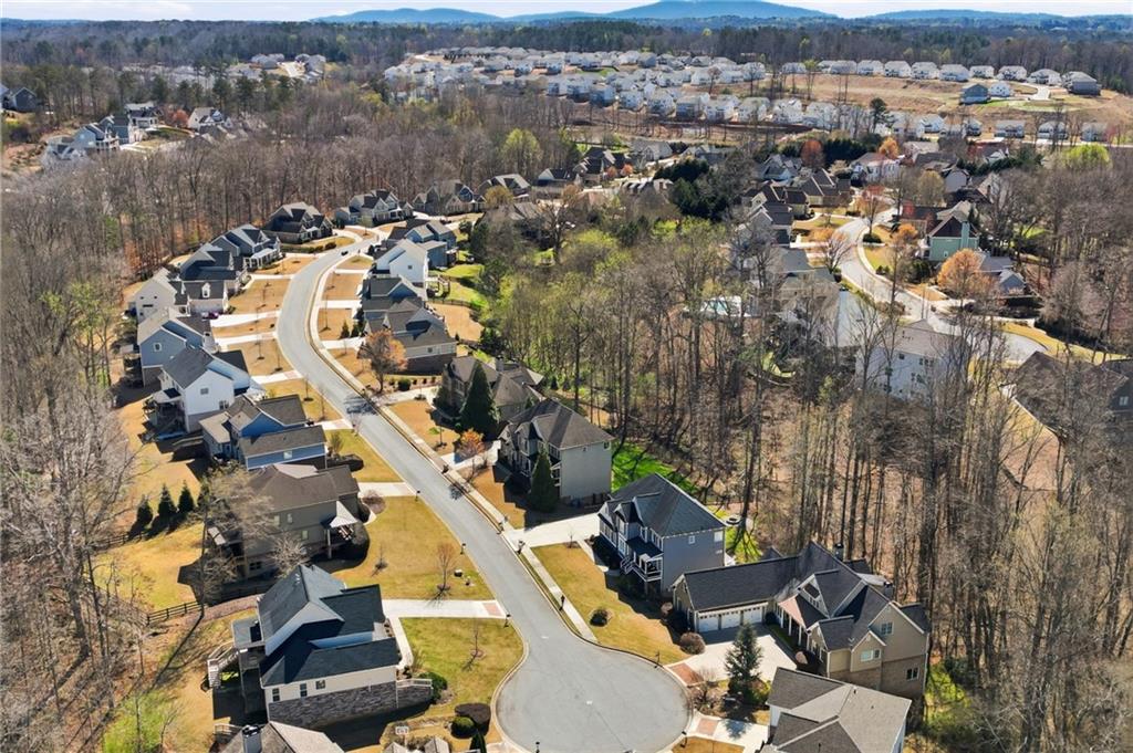 8840 Hightower Ridge Ball Ground, GA 30107 - Photo 55 of 74 an aerial view of residential houses with outdoor space