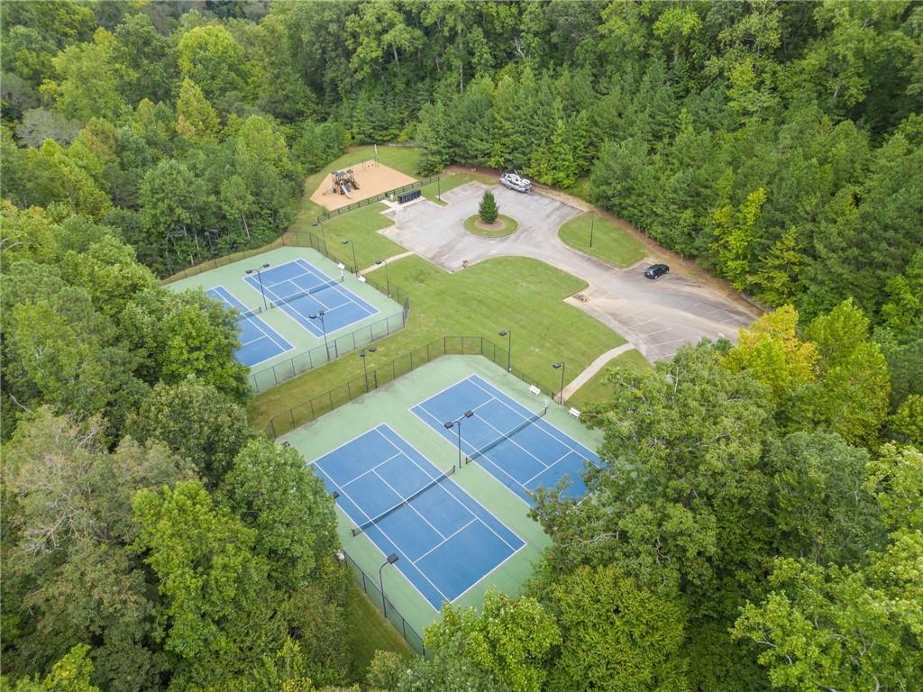8840 Hightower Ridge Ball Ground, GA 30107 - Photo 68 of 74 an aerial view of a house with a yard