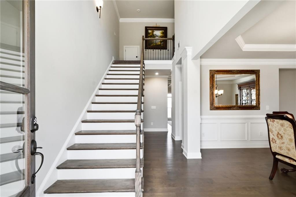 8840 Hightower Ridge Ball Ground, GA 30107 - Photo 7 of 74 a view of an entryway with wooden floor and door
