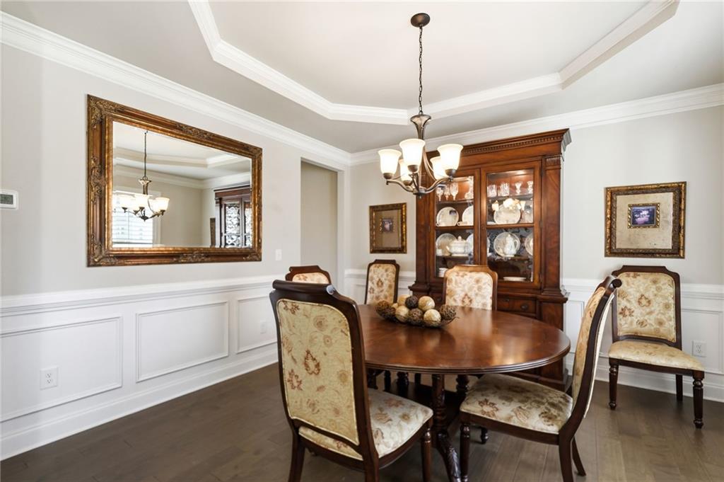 8840 Hightower Ridge Ball Ground, GA 30107 - Photo 8 of 74 a view of a dining room with furniture and window