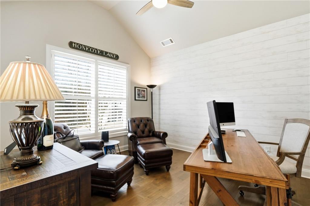 8840 Hightower Ridge Ball Ground, GA 30107 - Photo 10 of 74 a work room with furniture and a window