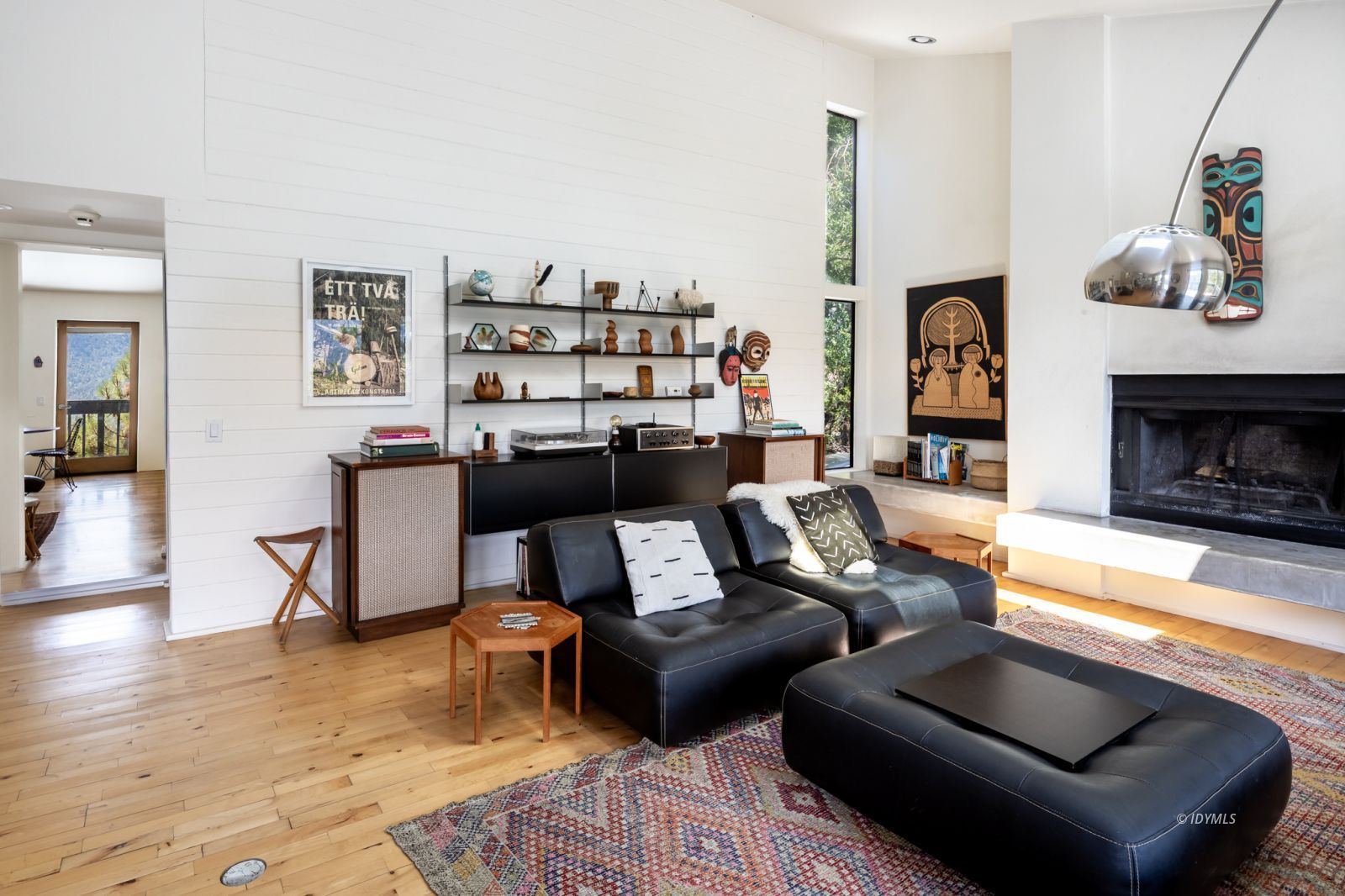 23916 Highway 243 Idyllwild, CA 92549 - Photo 15 of 47 a living room with furniture and a fireplace