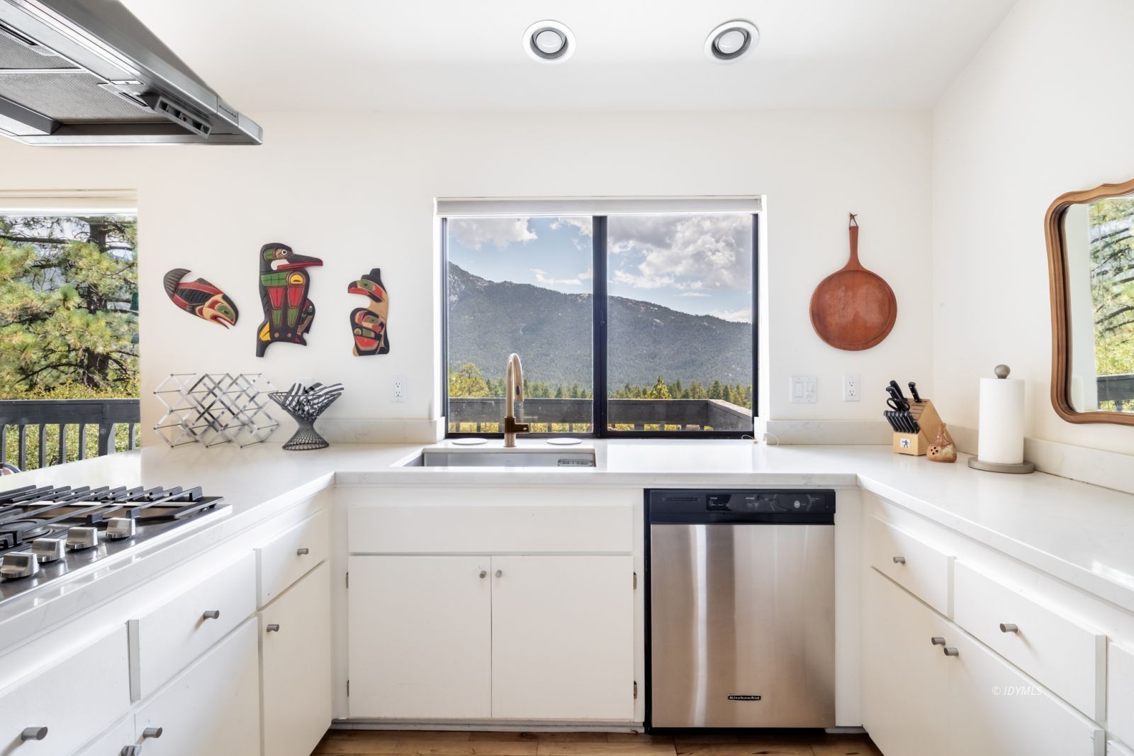 23916 Highway 243 Idyllwild, CA 92549 - Photo 19 of 47 a kitchen with a sink stove and cabinets