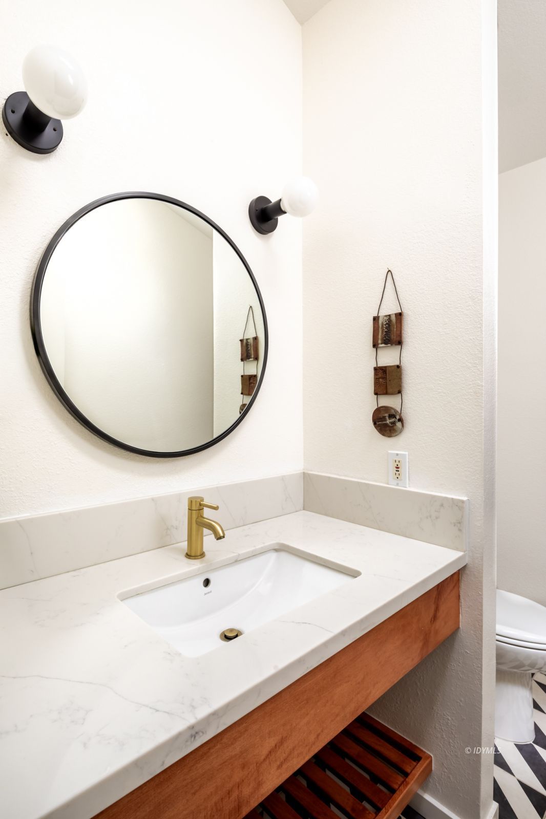23916 Highway 243 Idyllwild, CA 92549 - Photo 28 of 47 a bathroom with a sink and a mirror