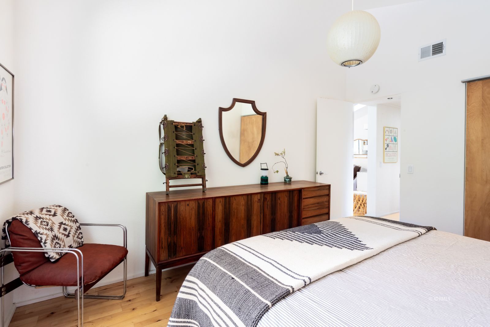 23916 Highway 243 Idyllwild, CA 92549 - Photo 32 of 47 a bedroom with a bed a dresser and chair