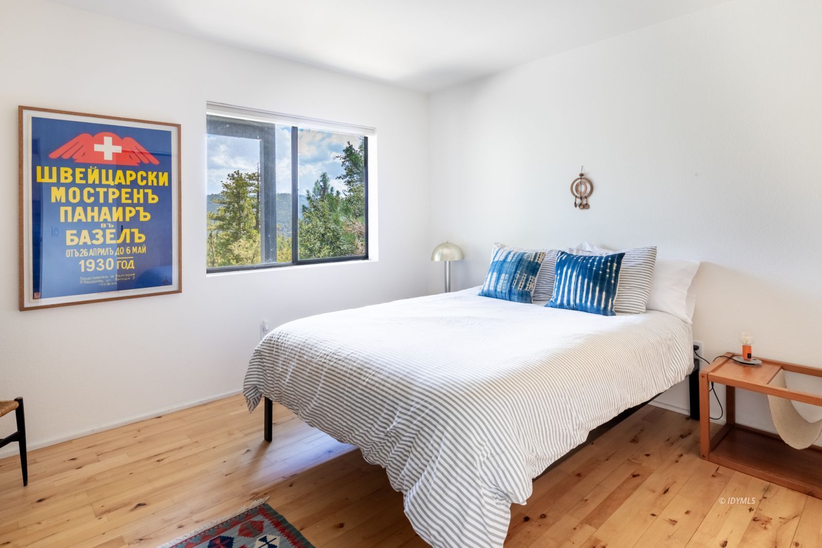 23916 Highway 243 Idyllwild, CA 92549 - Photo 34 of 47 a bedroom with a bed and a window