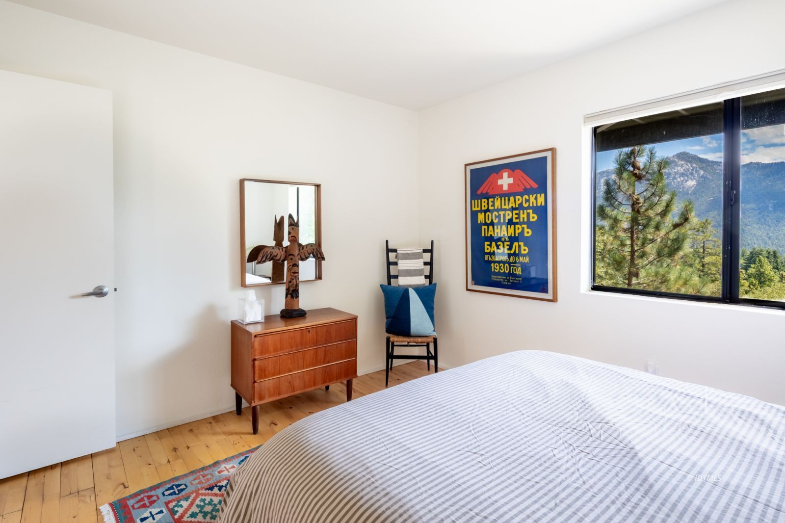 23916 Highway 243 Idyllwild, CA 92549 - Photo 35 of 47 a bedroom with a bed and a window