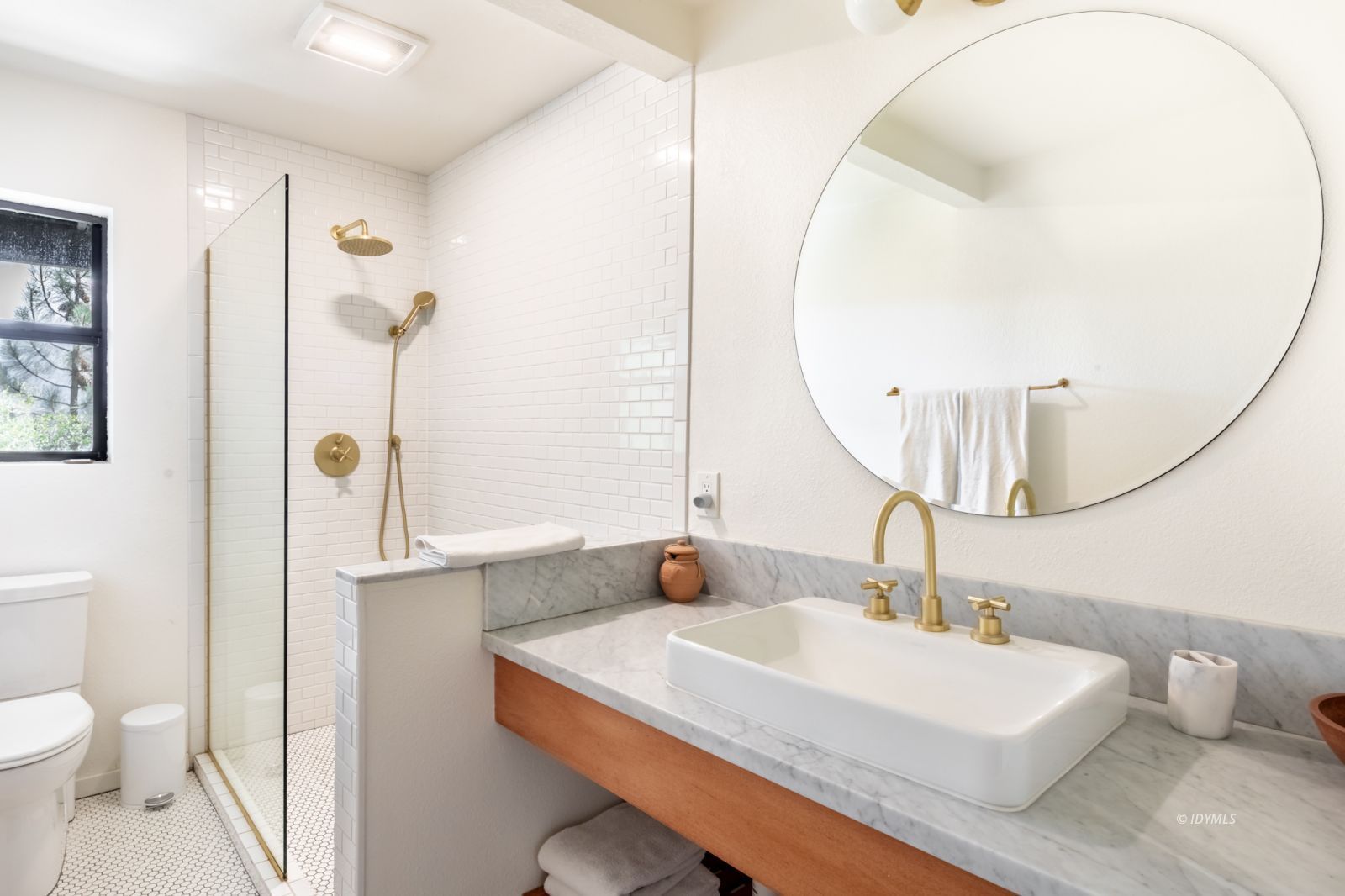 23916 Highway 243 Idyllwild, CA 92549 - Photo 42 of 47 a bathroom with a sink a toilet and a mirror
