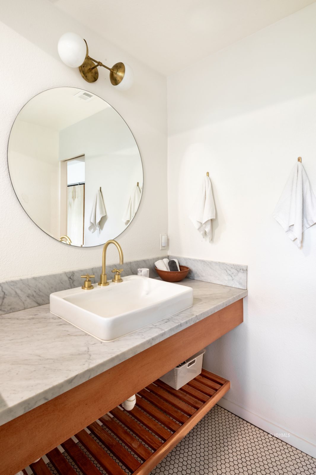 23916 Highway 243 Idyllwild, CA 92549 - Photo 44 of 47 a bathroom with a sink and a mirror