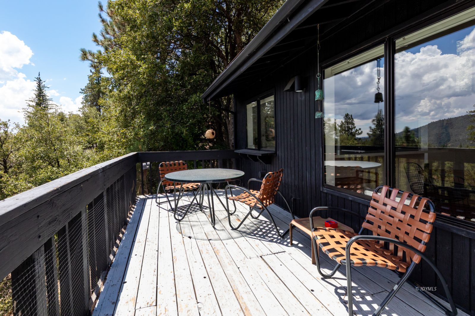 23916 Highway 243 Idyllwild, CA 92549 - Photo 47 of 47 a view of balcony with chairs and wooden floor