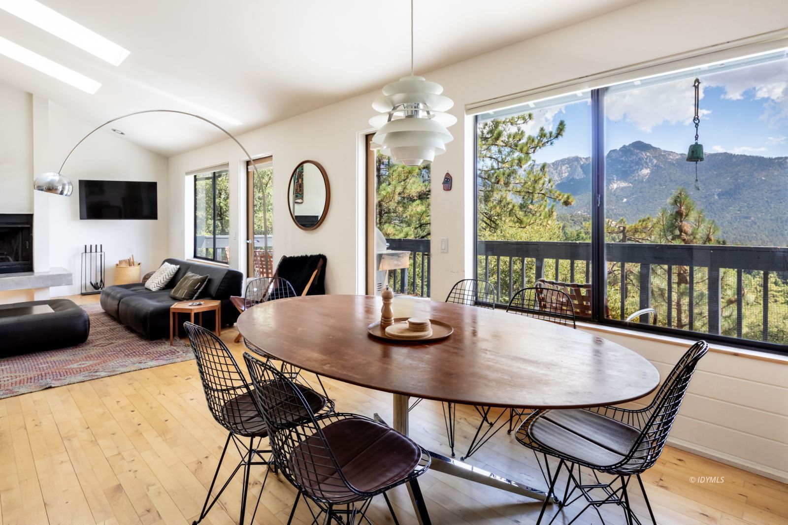 23916 Highway 243 Idyllwild, CA 92549 - Photo 9 of 47 a view of a dining room with furniture window and outside view