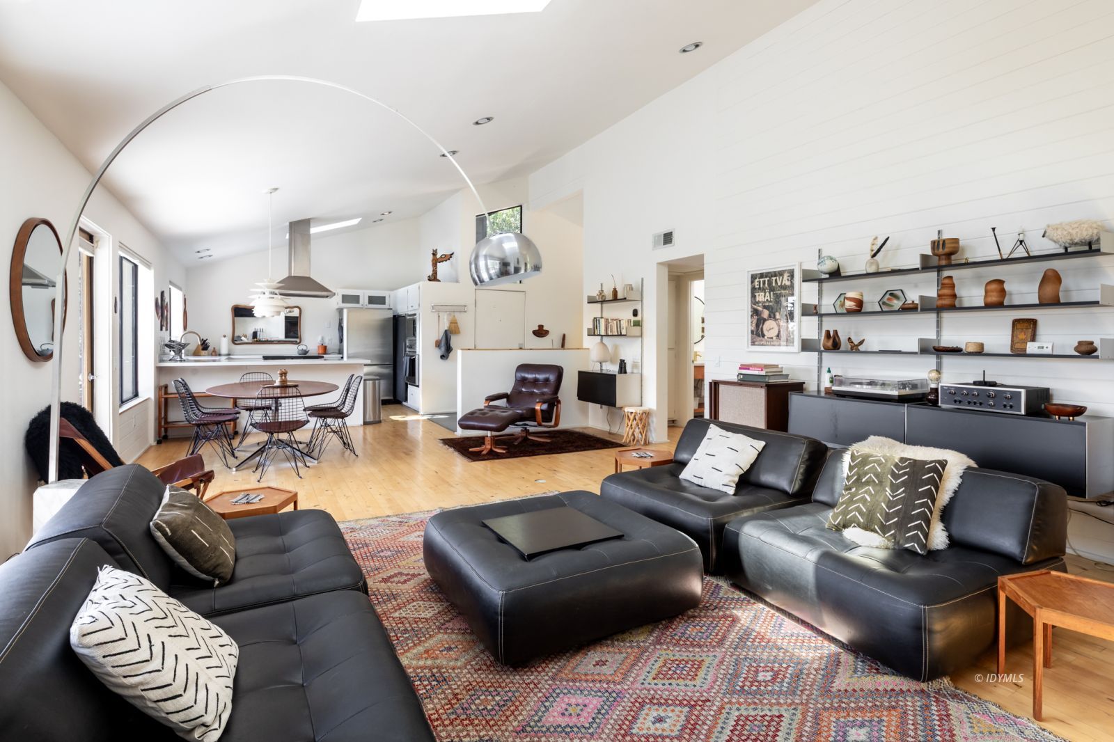 23916 Highway 243 Idyllwild, CA 92549 - Photo 10 of 47 a living room with furniture and a view of kitchen