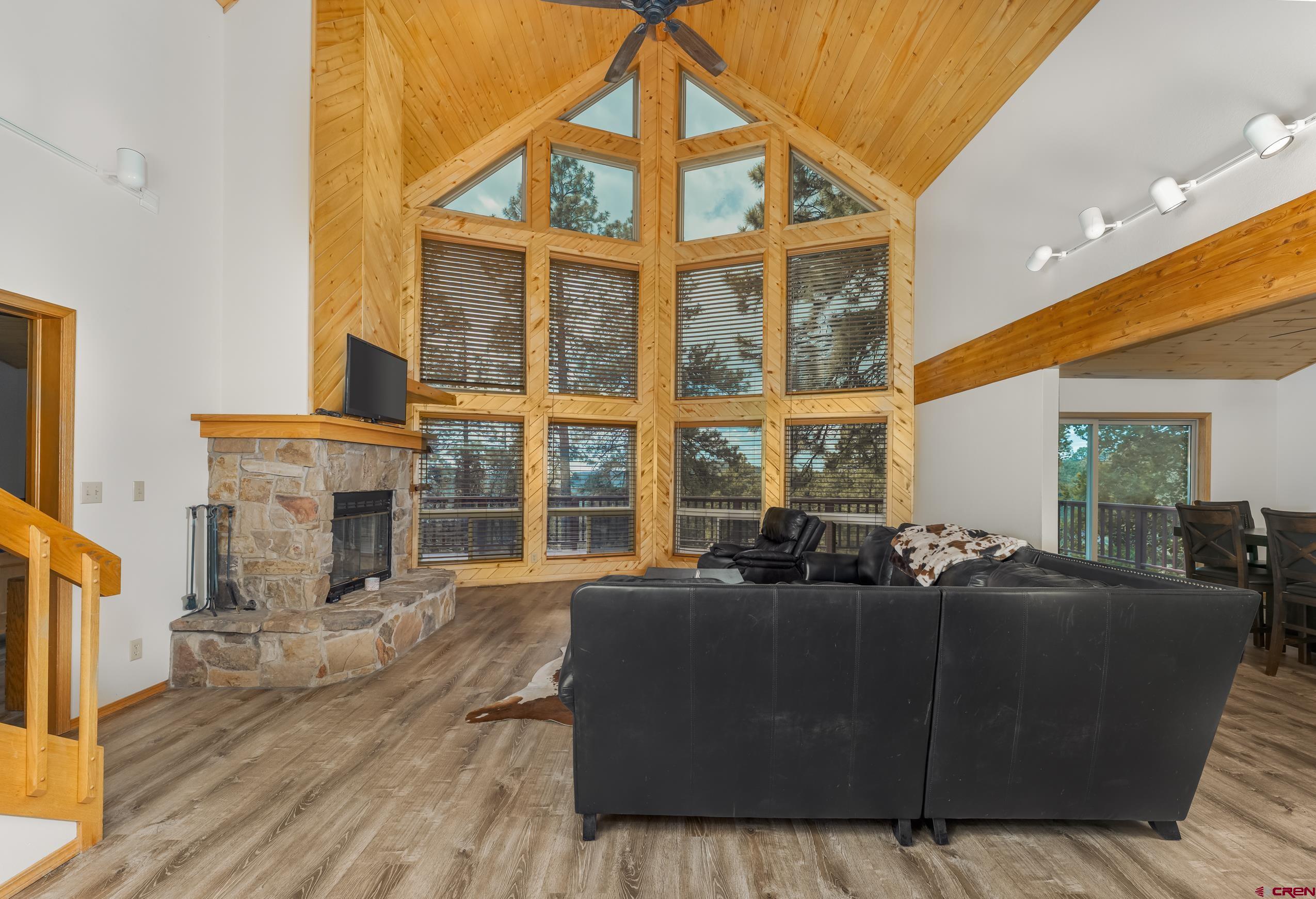 197 Buckhorn Road Bayfield, CO 81122 - Photo 9 of 34 a living room with furniture and large windows