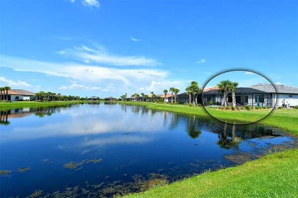 a kitchen with a table and chairs