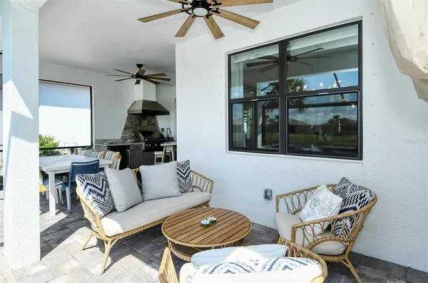 a kitchen with stainless steel appliances a stove a refrigerator and cabinets