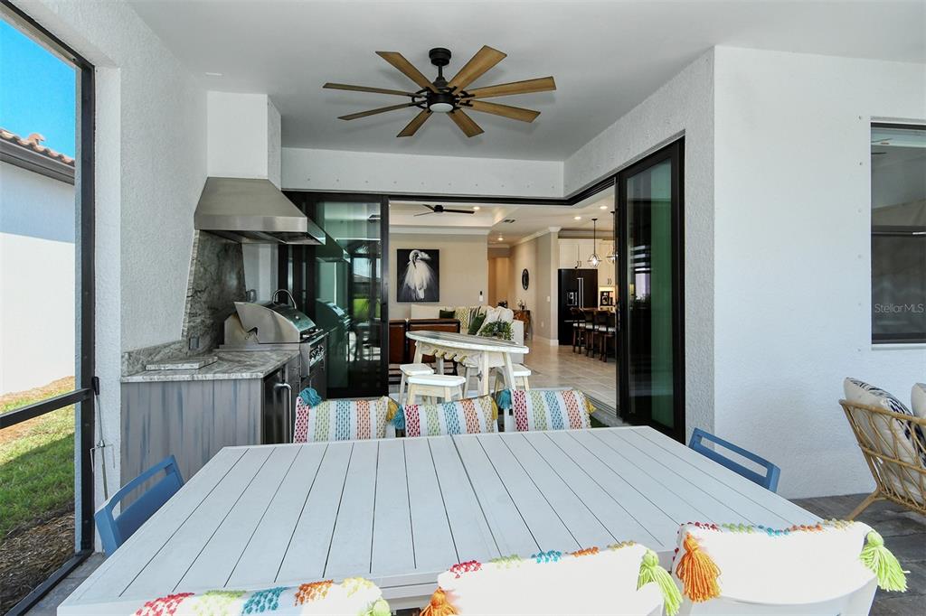 18114 Waterville Place Bradenton, FL 34202 - Photo 21 of 57 a kitchen with a table and chairs