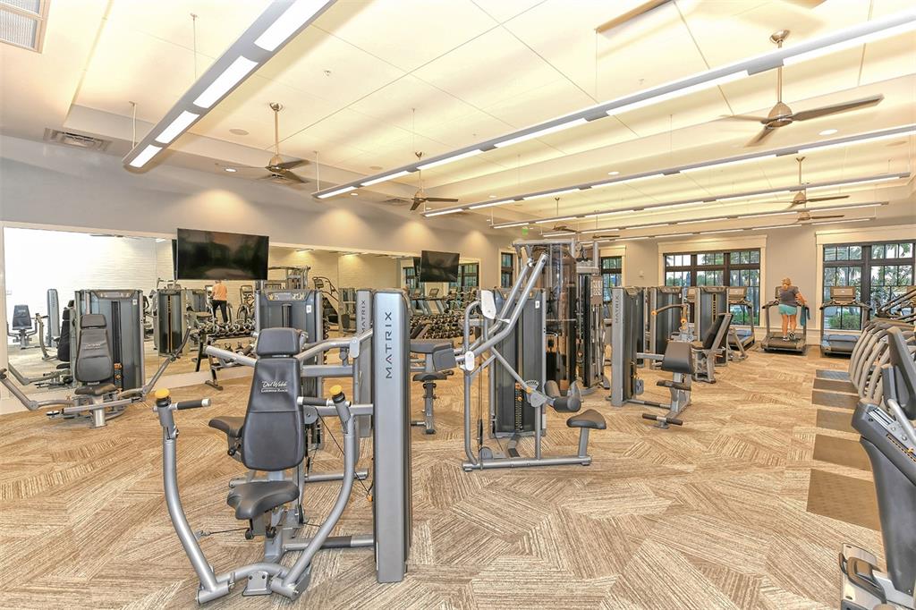 18114 Waterville Place Bradenton, FL 34202 - Photo 57 of 57 a view of a room with gym equipment