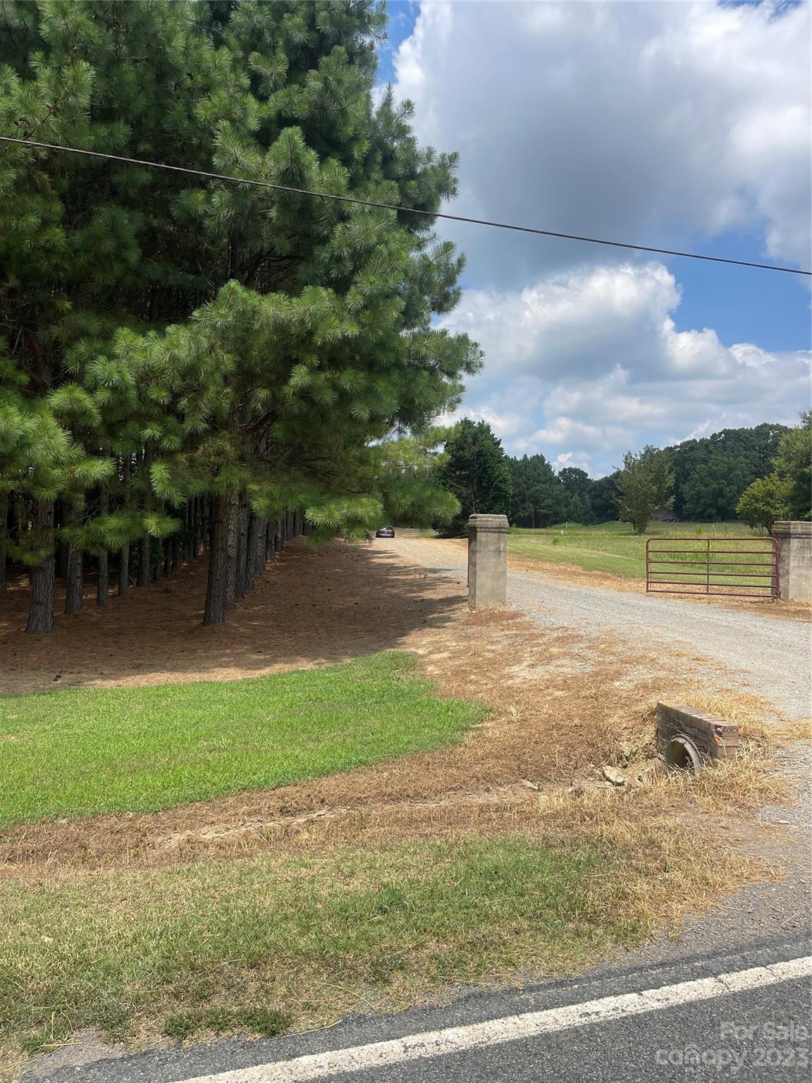 2301 Dutch Road Mount Pleasant, NC 28124 - Photo 5 of 14 a view of a lake with a big yard